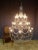 Important iron cage chandelier of the 20th Century with 25 lights. DIMENSIONS Height: 1m60. Diameter : 1m10. I have...