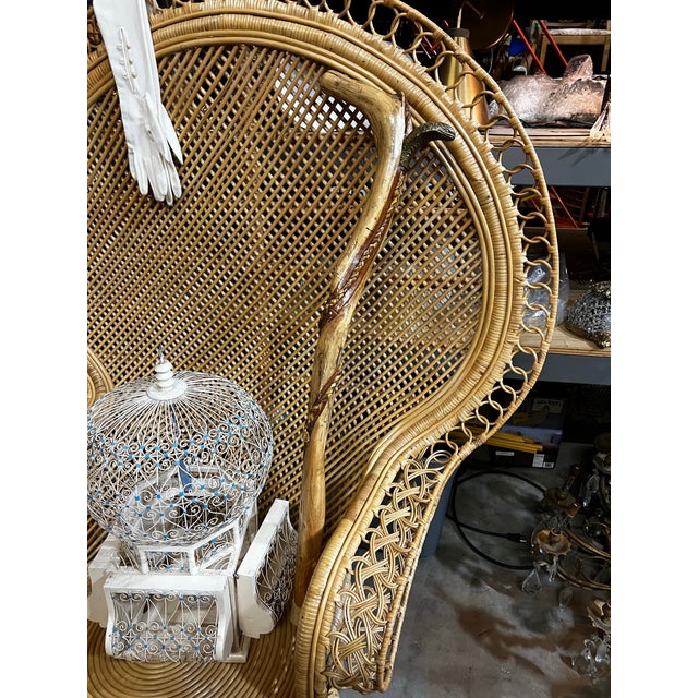 Up for consideration is a beautiful vintage wooden carved cane with brass snake and braided accents. This would look...