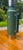 Iconic vintage Stanley green thermos with chrome accents and original folding handle. Classic American outdoor gear in...