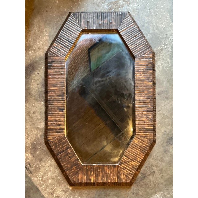 This monumental vintage wall mirror, in the celebrated style of Harrison Van Horn, is a masterclass in Organic Modern...