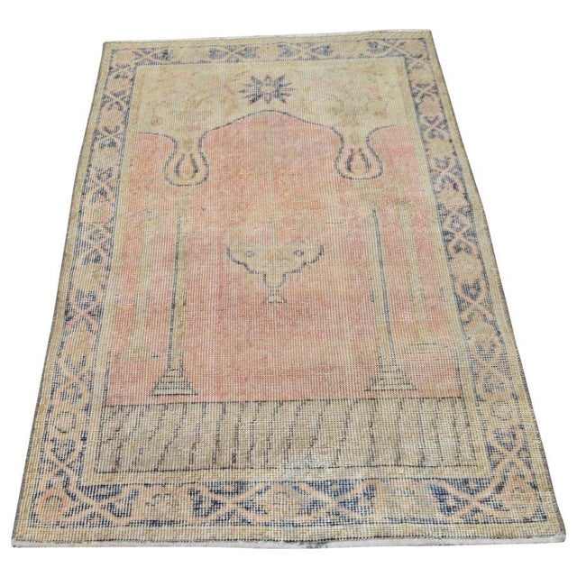 Hand-knotted with care using traditional rug-making techniques, this wool rug blends timeless craftsmanship with a modern...