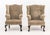 Pair of George III Style Upholstered Wingback Arm Chairs, on ebonized claw and ball feet. 44.5" H x 27" W x 26" D; seat:...