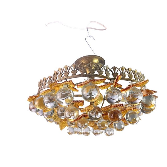 Chandelier in Forest Green Murano Glass and Brass, in Good conditions. Designed 1950 to 1959 Up to 250V (Europe/UK...