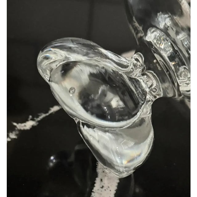 Elegant mid-century art glass bowl featuring a sculptural cluster base and crystal-clear form. Hand-blown with beautiful...