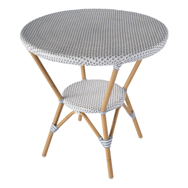 Tobias 30 in. W Outdoor Round Rattan and Metal Bistro Table, Blue/White Dot / Natural Rattan Frame For Sale