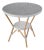 Tobias 30 in. W Outdoor Round Rattan and Metal Bistro Table, Blue/White Dot / Natural Rattan Frame For Sale