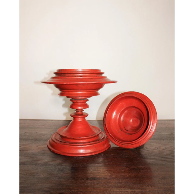 Traditional Burmese offering vessels ("hsun-ok") were historically associated with royal monasteries, and were used by...