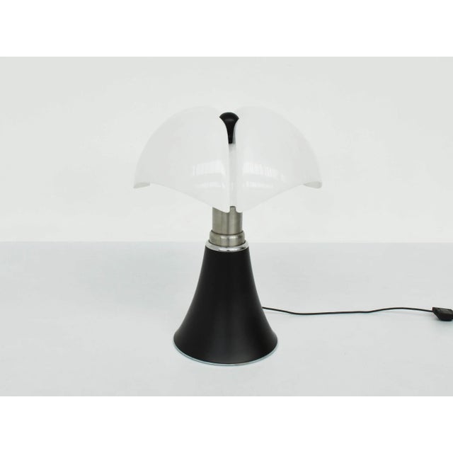 Adjustable HT from 75 to 90 cm I have official proof of authenticity such as vintage catalogs, designer records, or other...