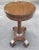 A newly and fully refinished solid mahogany American Empire Oval Pedestal side table. Features four large scroll feet...