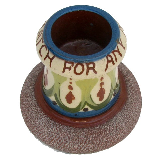 This charming match strike / vesta is lovely example of English Torquay red earthenware pottery. Decorated in the Art...