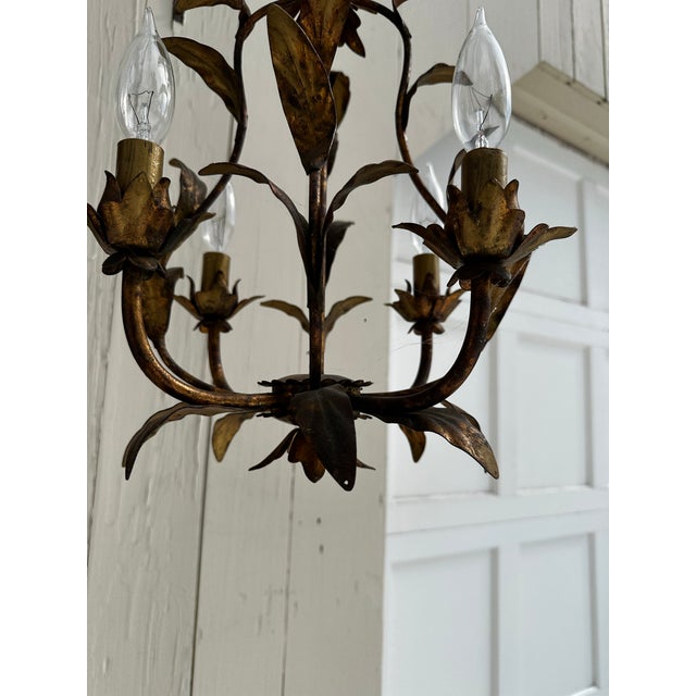 Old Lights On is pleased to offer this vintage four light Hollywood Regency hanging fixture. It is wired and ready to...