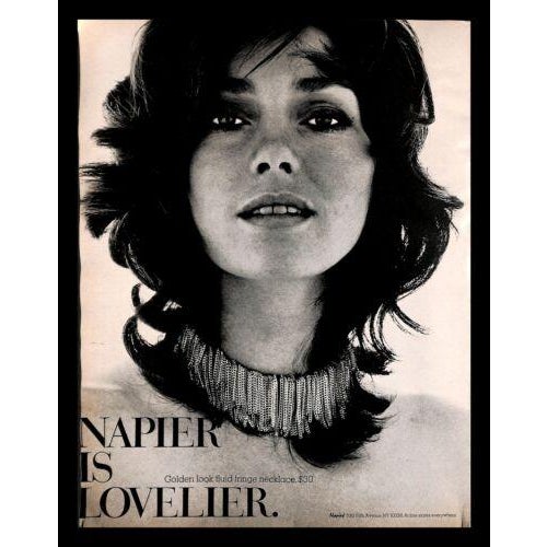 1971 goldtone fringe clip and adjustable screw back earrings. Marked "NAPIER" on the clips. Measure: 1 inch long by 1/2...