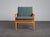 A stylish scandinavian modern lounge chair from denmark, dating from the 1970s. The design combines a comfortable...