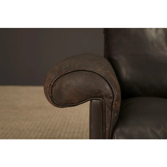 A beautifully worn vintage DS-31 reclining swivel armchair by De Sede, Switzerland, dating to the 1970s. This high-back...