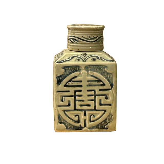 This vintage Chinese-style ginger jar features a classic square form crafted from heavy stoneware with a subtle, cream-...