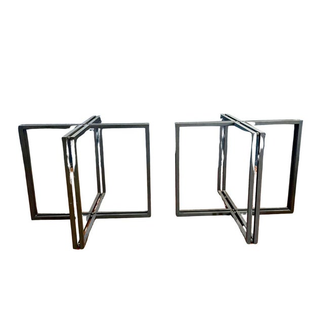 Bold and architectural, this pair of dark metal table bases brings modern sophistication to any setting. Each base is...