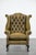 We are offering this moss green cowhide leather Chesterfield wing chair in English style, finished with decorative nails....