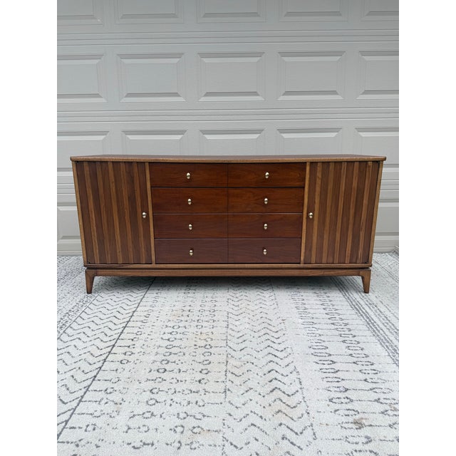 This is a beautifully restored Broyhill credenza, the art of the highly collectible Broyhill Premier division. This...