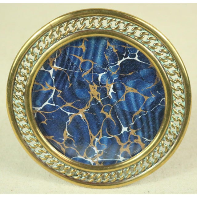 A traditional English photo frame dating from the beginning of the 20th century with a chain link motif. Round chain...