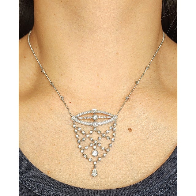 This stunning diamond necklace features 89 natural sparkling diamonds with a total weight of 2.23 carats, meticulously set...