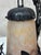 A charming Art Deco lamp combining a wrought iron frame with a glass diffuser in shades of yellow and amber, bearing the...