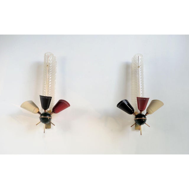 Large wall lights by M. Kobis and R. Lorence, France 1950. The acrylic palmette is backlit by two bulbs, the sphere has...