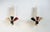Large wall lights by M. Kobis and R. Lorence, France 1950. The acrylic palmette is backlit by two bulbs, the sphere has...