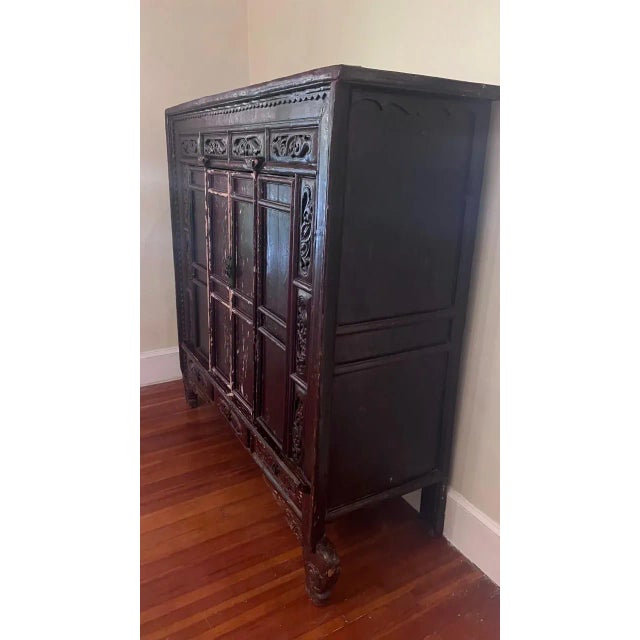 Chinoiserie Late 20th Century Monumental Chinese Style Carved Wood Wedding Cabinet With Timeworn Patina For Sale - Image 3 of 12