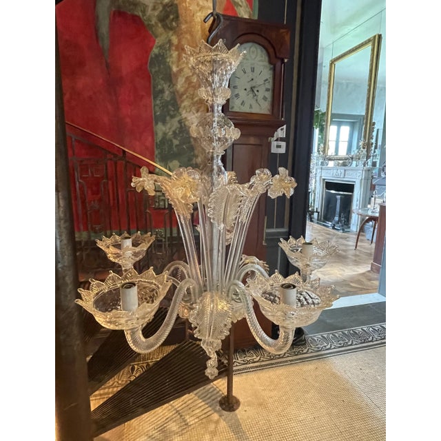 This traditional elegant five-arm chandelier was manufactured in Venice by the Venini Family in the 1950s. It is made of...