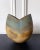 A stoneware vessel with glazed and banded stripes design by British studio ceramist John Ward (1938-) circa 1980s. The...