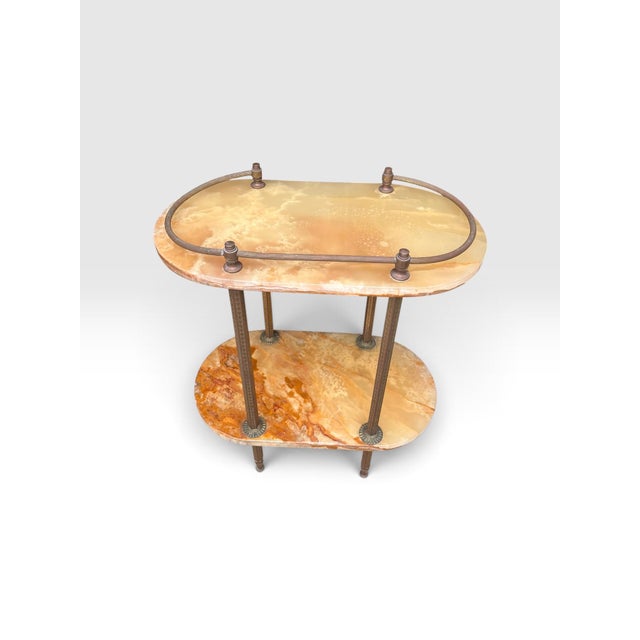 Elevate any entryway, hallway, or living space with this elegant vintage Hollywood Regency console table, featuring two...