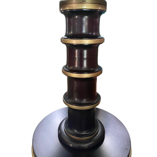 A distinctive chair side spool table by Kindel Furniture, rooted in the design legacy of Dorothy Draper, who famously...