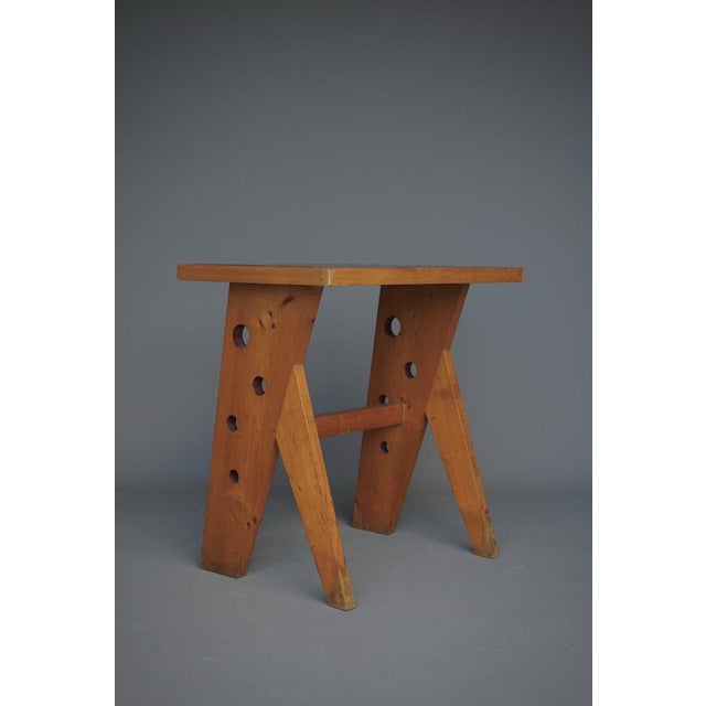 A stylish French desk from the 1950s. It has a textured linoleum top and pine wood construction. It would work equally...