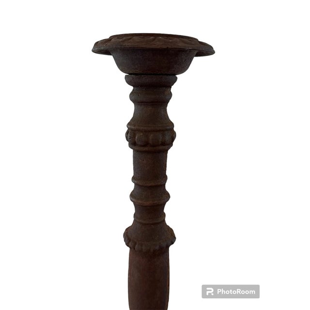 These antique candle stands with a minimalist look and a beautiful rusty patina embody a captivating fusion of simplicity...