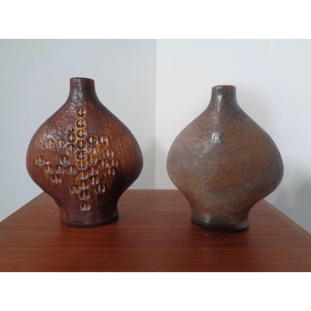 Pair of Atelier ceramic vases from the 1960s. Design by Gerda Heuckeroth for Carstens Tönnieshof. Height: 26/27 cm. Width:...