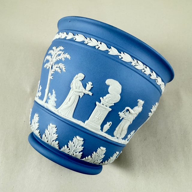 From Wedgwood, a light Blue Jasperware cache pot or jardiniere, date marked 1970. Jasperware, introduced by Josiah...