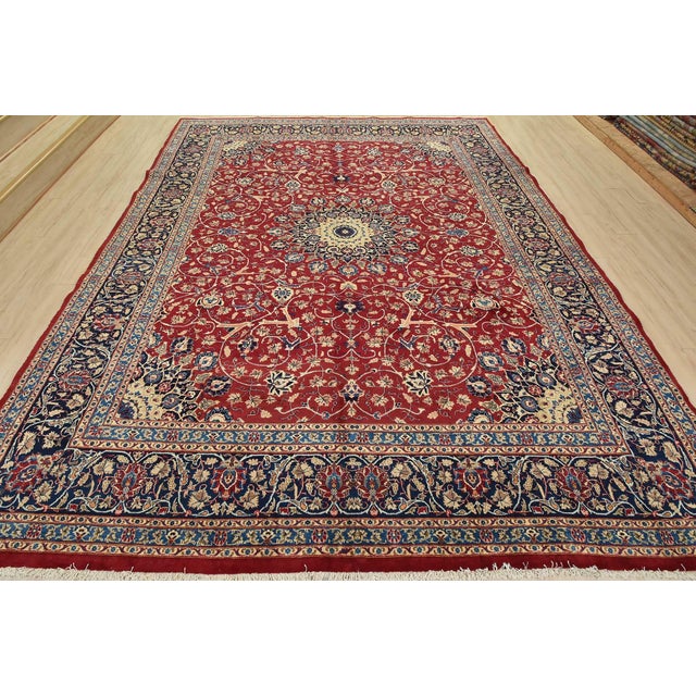 An authentic vintage traditional Kashmar rug hand-knotted with fine wool and natural dyes. This beautiful oriental rug...