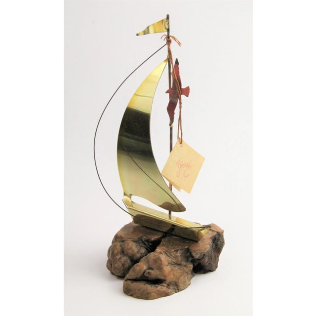 9-1/4" high x 5" wide x 4" deep. Yosi sculpture with original tag intact dated 1981.