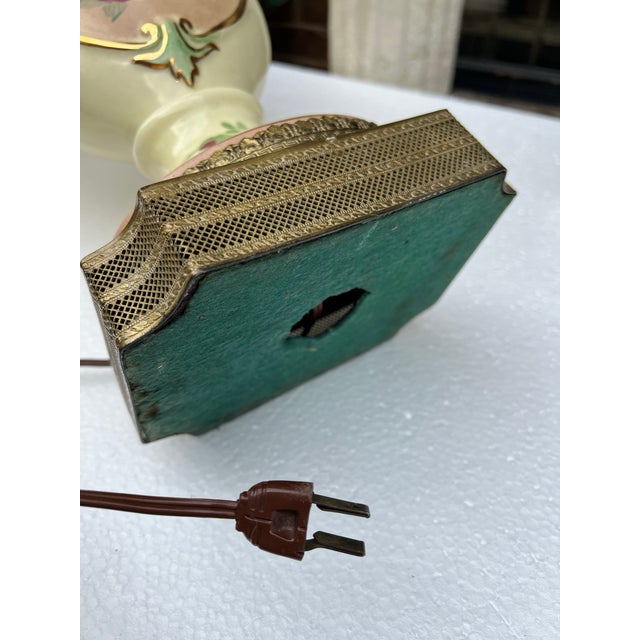 Up for consideration is a beautiful cream colored lamp with rose details. This would look lovely in your home and it is a...