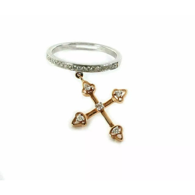 This stunning ring is crafted from 18k white and rose gold featuring a white gold with with pave set diamonds on the front...