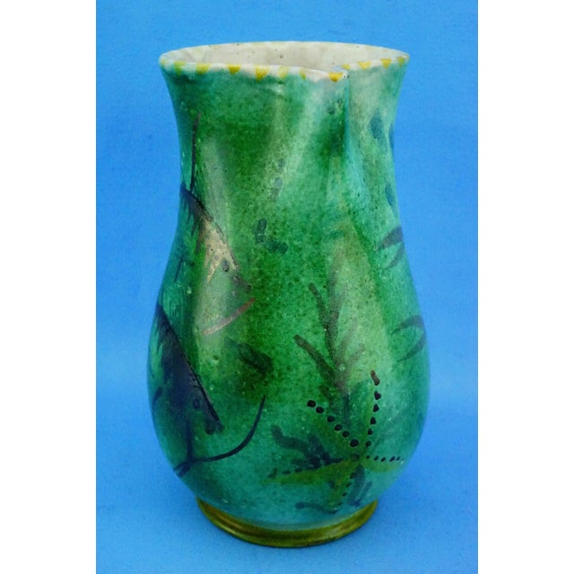 MEASUREMENTS: Height: 20 cm; Width: 15 cm; Depth: 11.5 cm; Weight: 0.705 kg Item : A refined majolica jug, entirely wheel-...