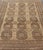 Measures: 7'2 x 9'6. This Turkomen Ersari rug has been hand-knotted in the finest wool. The rug features an all-over...