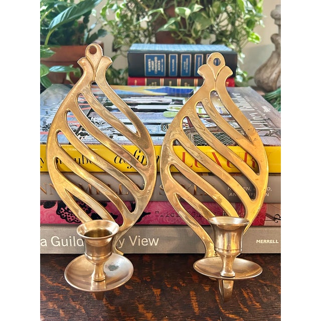 These brass candle sconces are perfect for a guest bath or entry… their size also lends them to work in a gallery wall....