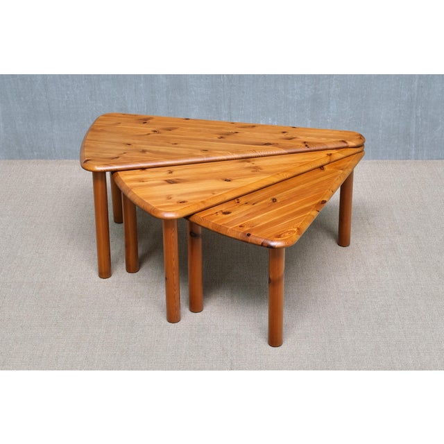 This striking modular fan-shaped coffee table was produced in Sweden in the late 1960s. The design features three...