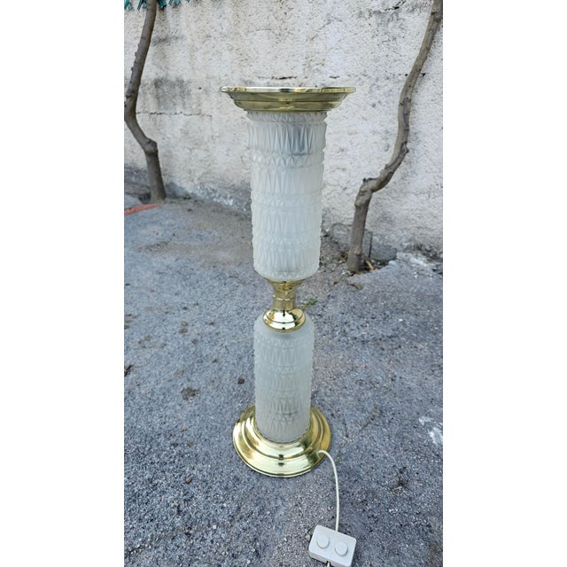 Splendid hourglass lamp in brass and Murano glass with double switch, restored and polished by hand. Working. European...