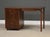 A mid century modern walnut desk with a single bank and finished back. Made in USA. Circa 1960’s. Professionally...