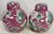 This is a matched pair of chinoiserie ginger jars with lids feature lotus flowers and fauna. The mauve background is a...