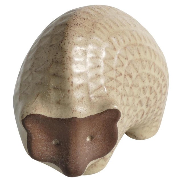 This Scandinavian Modern earthenware hedgehog from the 1960s exudes charm with its glazed zigzag pattern on beige fur. The...