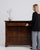 A sophisticated Biedermeier buffet featuring a rich mahogany finish and elegant marble top. The clean lines and lack of...