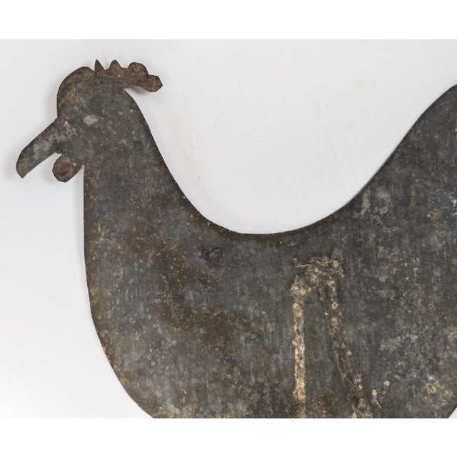 We are selling this simple charming folk art style sheet metal rooster. This rooster was probably intended as a garden...